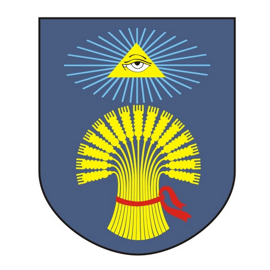 Coat of arms featuring a blue shield with a stylized yellow sheaf of wheat, a red ribbon, and an eye within a triangle above, symbolizing agriculture and vigilance.