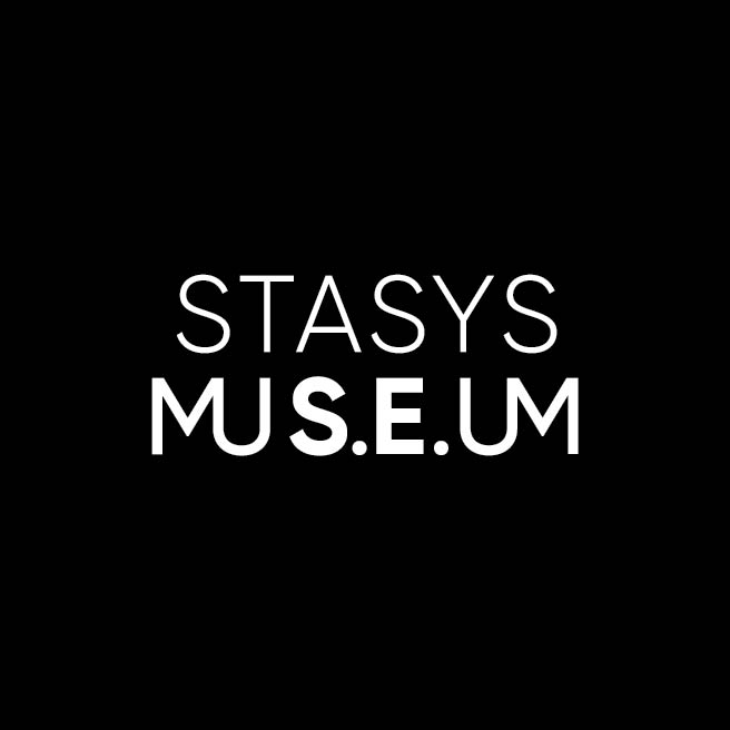 Logo of Stasys Museum, featuring the name "STASYS" in bold white letters and "MUSE.U.M" in a modern font, set against a black background.