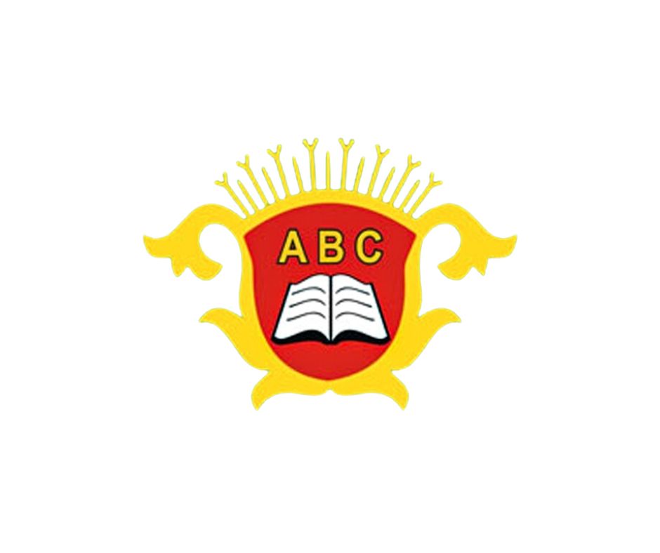 Logo of ABC educational institution featuring a red shield with an open book and decorative yellow elements, symbolizing knowledge and learning.